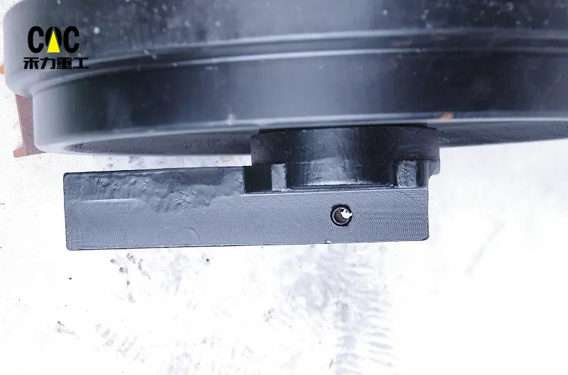 China Cheap price Excavator Idler - Wholesale fabricated idler roller excavator track idler for HYUNDAI R130 front idler wheel – Heli detail pictures