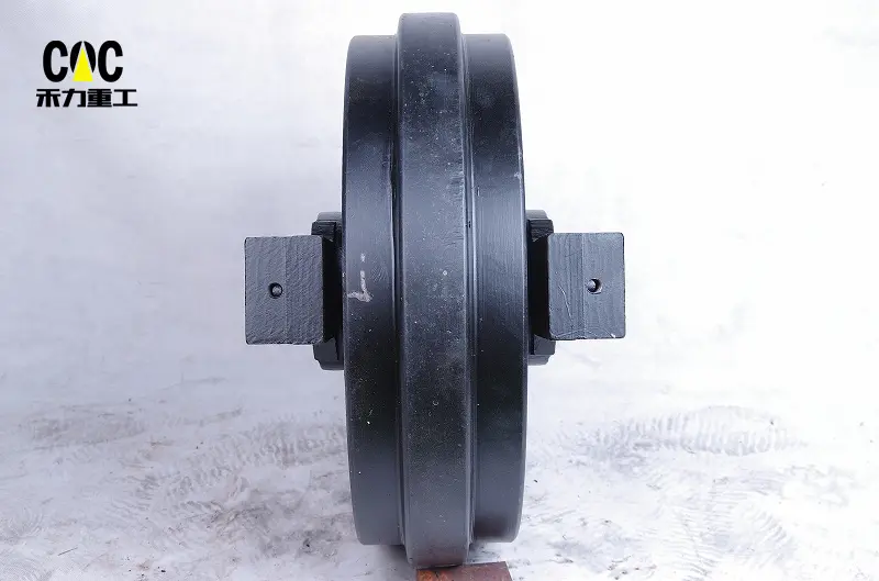 China Cheap price Excavator Idler - Wholesale fabricated idler roller excavator track idler for HYUNDAI R130 front idler wheel – Heli detail pictures